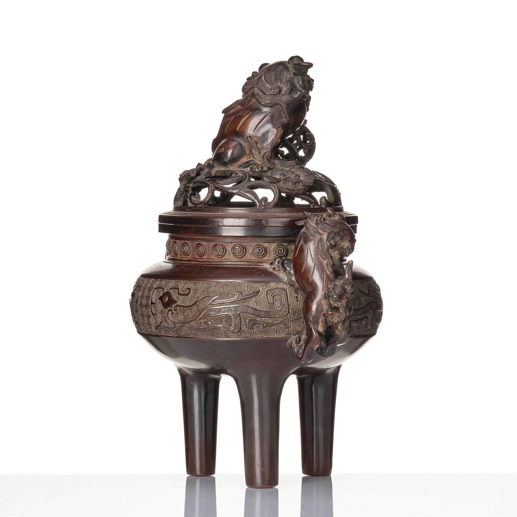 A Japanese insence burner with cover and liner, 19th Century.