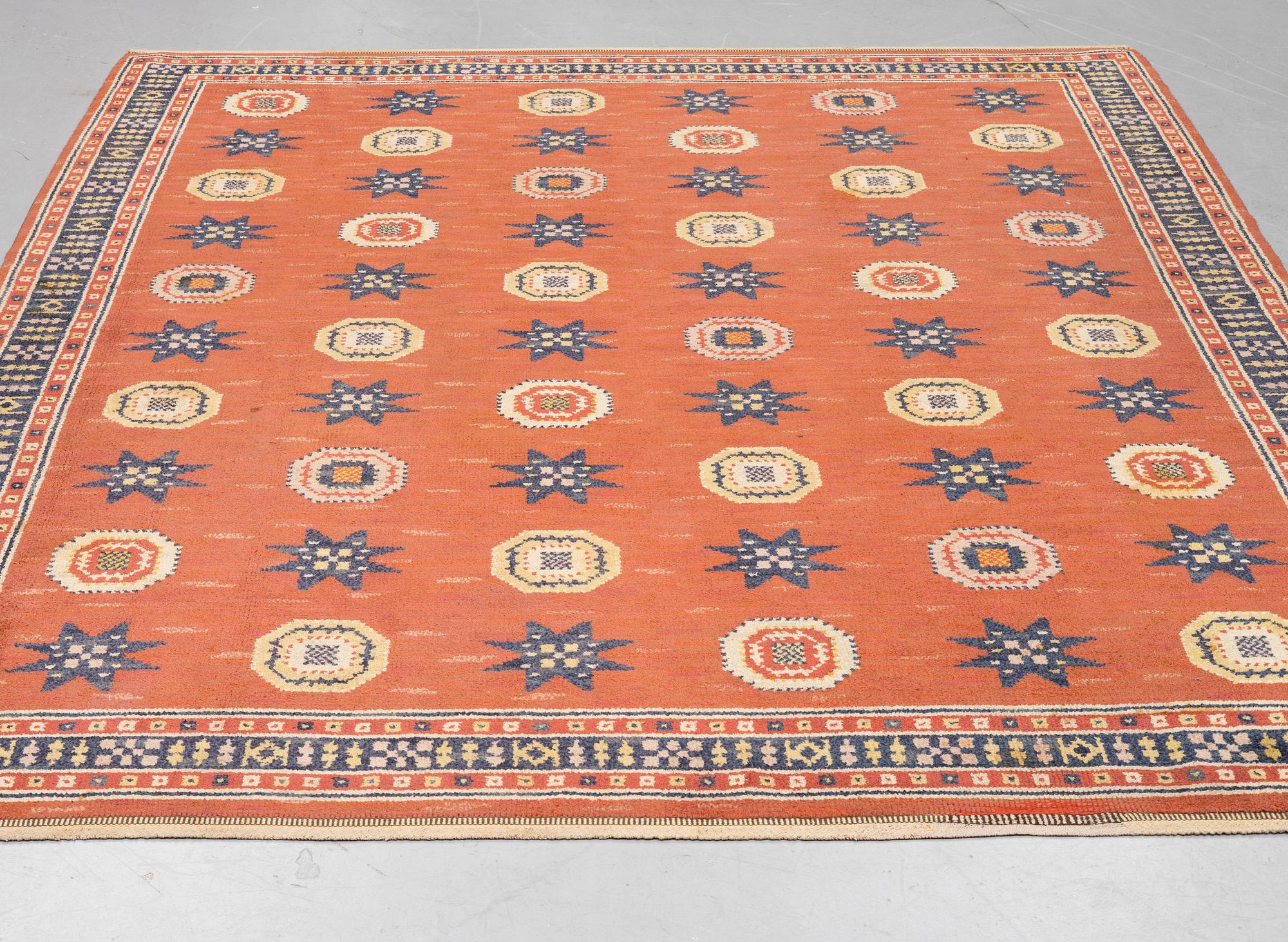 Märta Måås-Fjetterström, a carpet, "Röd Flossa", knotted pile, ca 300 x 272 cm, signed AB MMF.