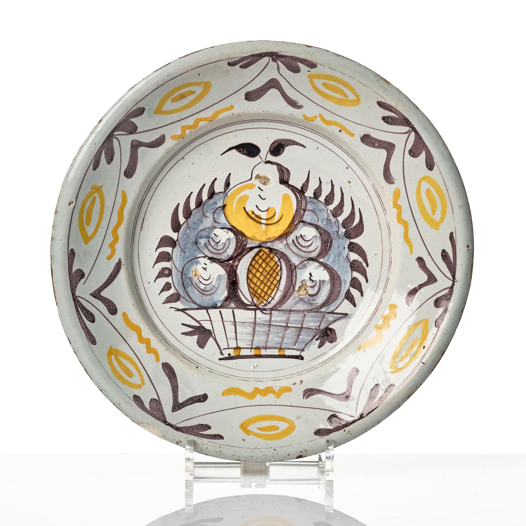 A group of three faience dishes, 18th century.