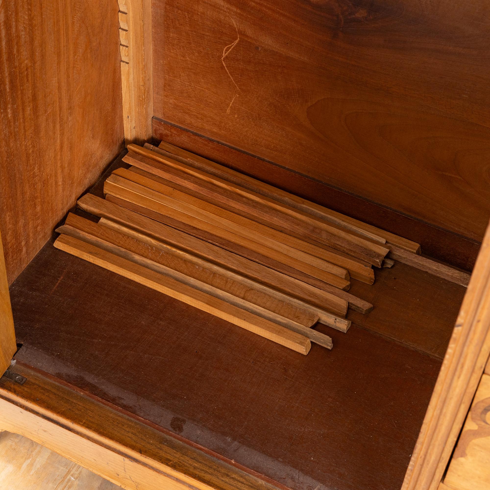 A cabinet, early 20th Century.