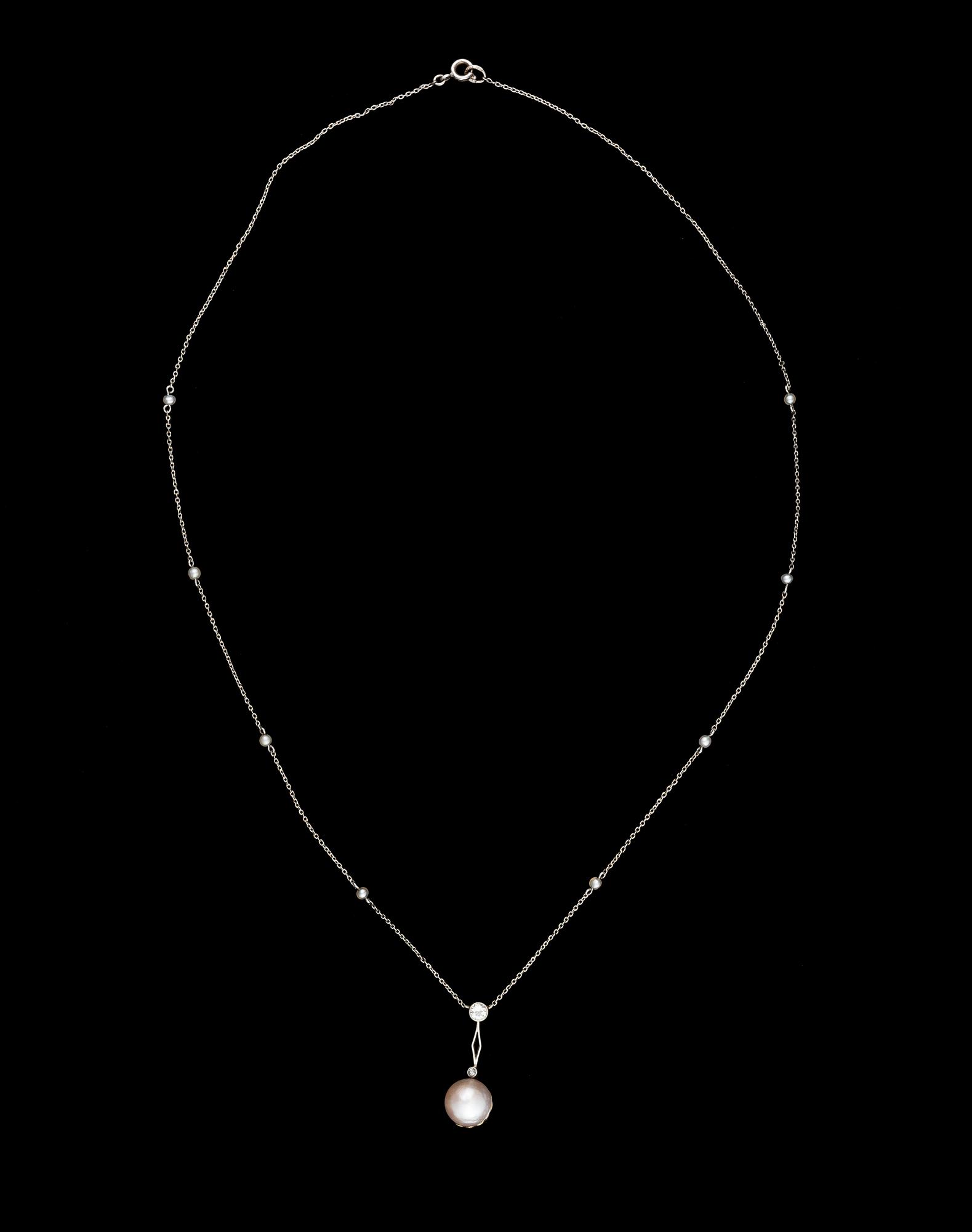 A PENDANT, platinum, diamond, pearl. Russian maker's marks, St Petersburg early 1900s.