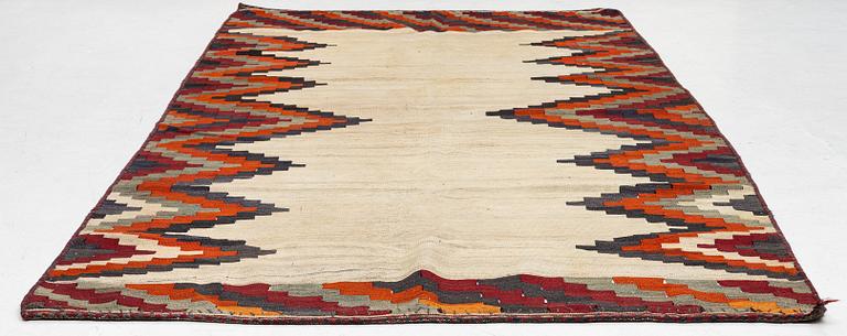 A semi-antique Qashqai kilim, c. 350 x 188 cm.