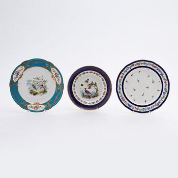 Two porcelain plates and a sacuer, possibly Sèvres, late 18th Century.