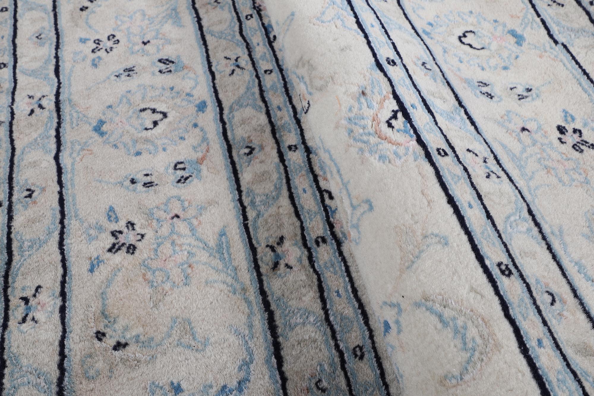 A rug, Nain, part silk, 6 Laa, ca 240 x 165 cm.