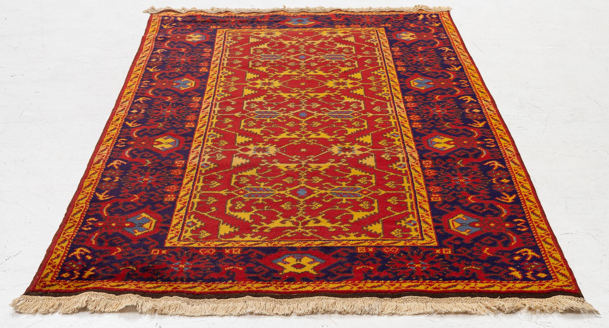 A semi antique Romanian "Lotto" rug, c. 214 x 123 cm.