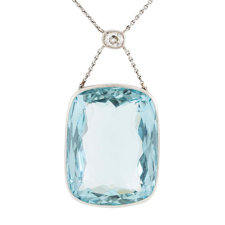 A platinum necklace with a faceted aquamarine and an oval old-cut diamond.