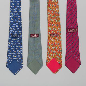 A set of four silk ties by Hermès.