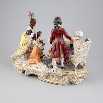 A Rococo style porcelain figurine group, Rudolstadt Volkstedt, Germany, early 20th Century.