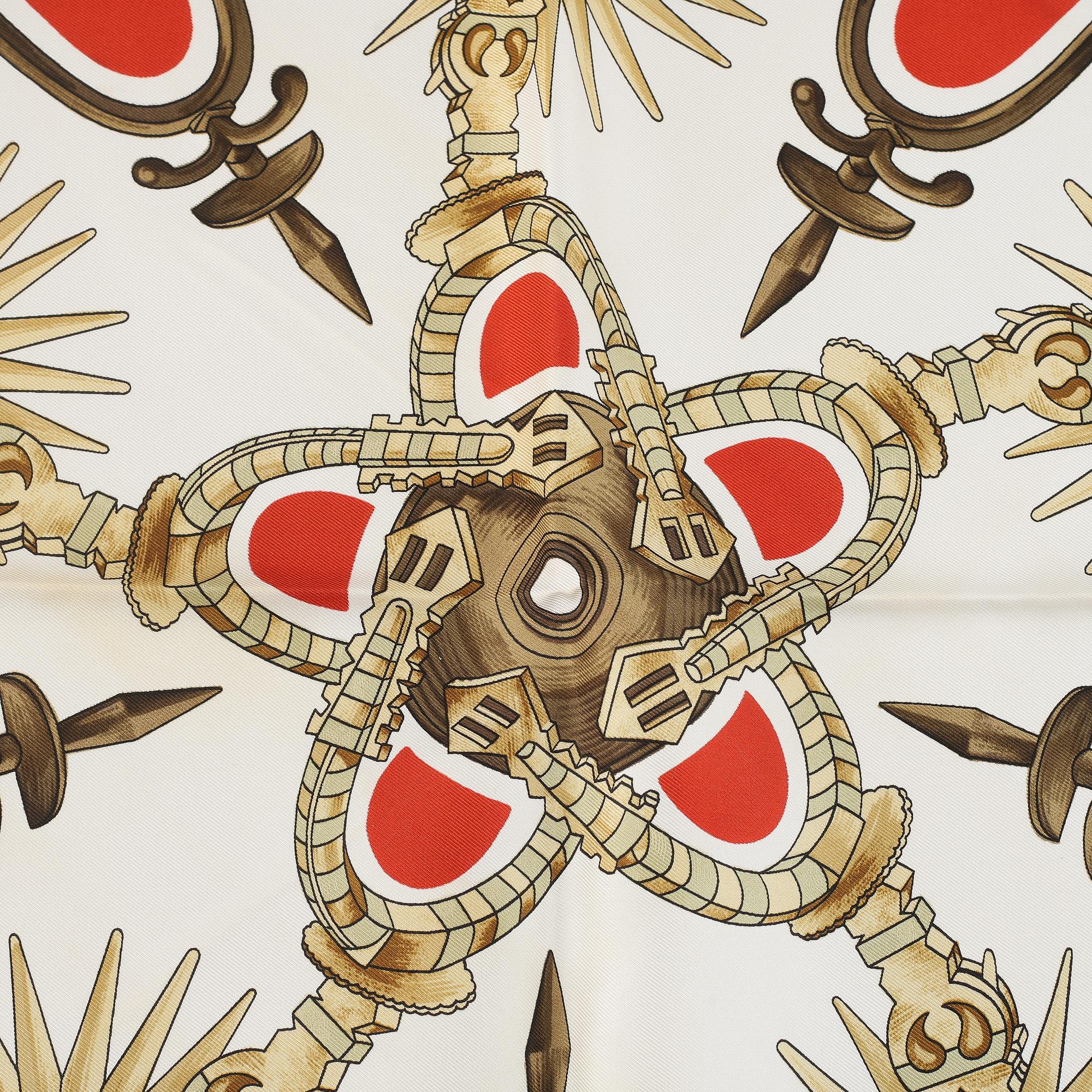 Hermès, a 'Les Eperons' silk scarf.