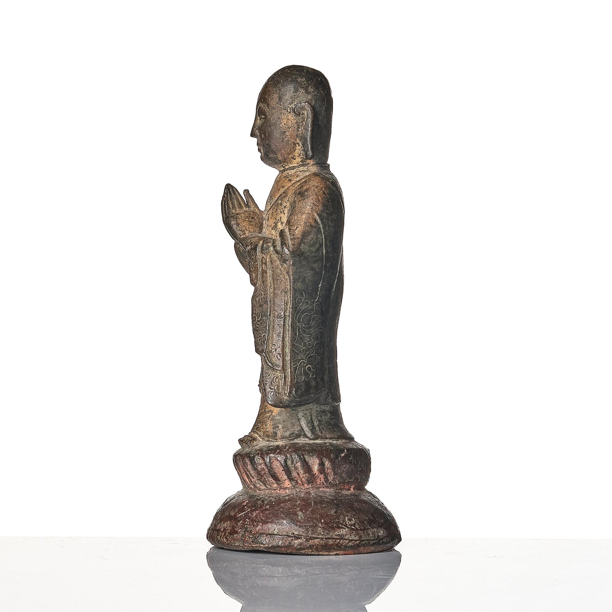 A bronze sculpture of Ananda, Ming dynasty (1368-1644).