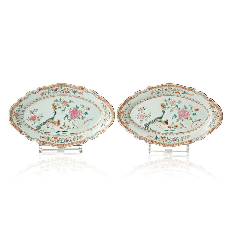 A pair of famille rose 'double peacock' dishes, Qing dynasty, Qianlong (1736-95).