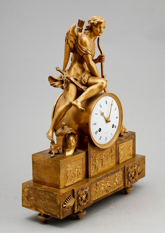 A French Empire early 19th century gilt bronze mantel clock.