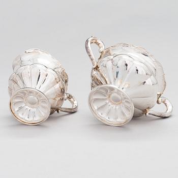 A silver coffee pot, a parcel-gilt sugar bowl and cream jug, Turku Finland 1946 and 1985.