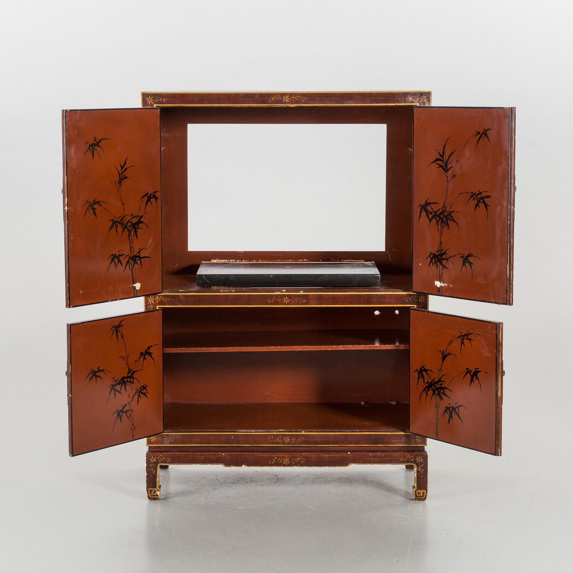 A Chinese style cabinet, later part of the 20th cwentury.