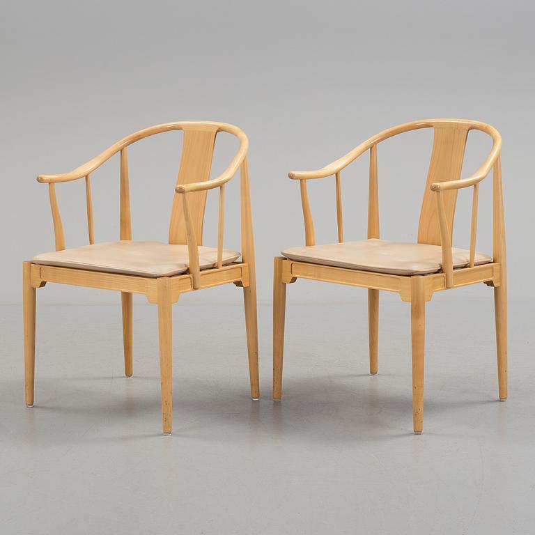 A pair of Hans J Wegner 'China' chairs, Fritz Hansen, Denmark 1987.