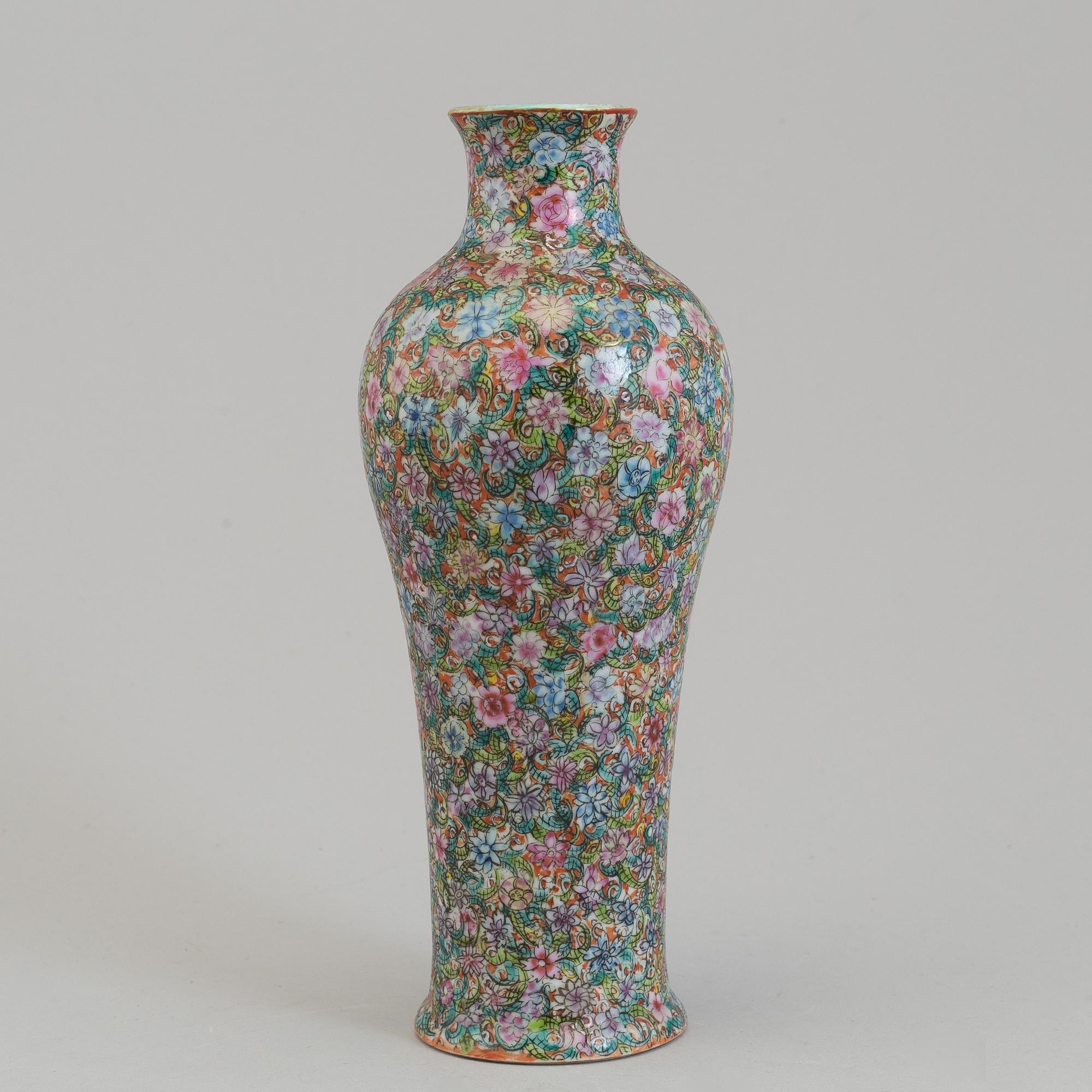 A Chinese 20th century famille rose 'mille fiore' vase, with Qianlong seal mark.