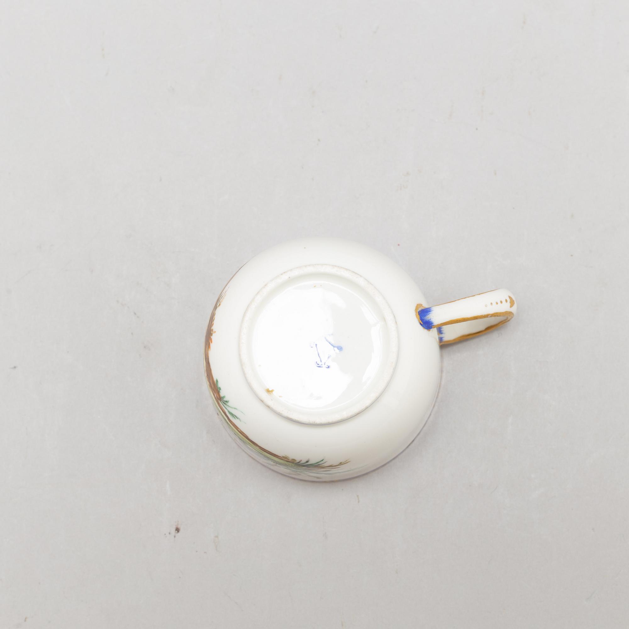 A pair of cups and saucers, "Sévrès"like mark, 19th century.