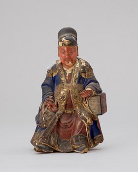 119. A polychrome wood figure, late Qing dynasty (1644-1912).