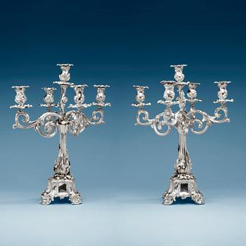 868. A pair of Swedish mid 19th century silver candelabra, marks of Gustaf Möllenborg-Féron, Stockholm 1856.