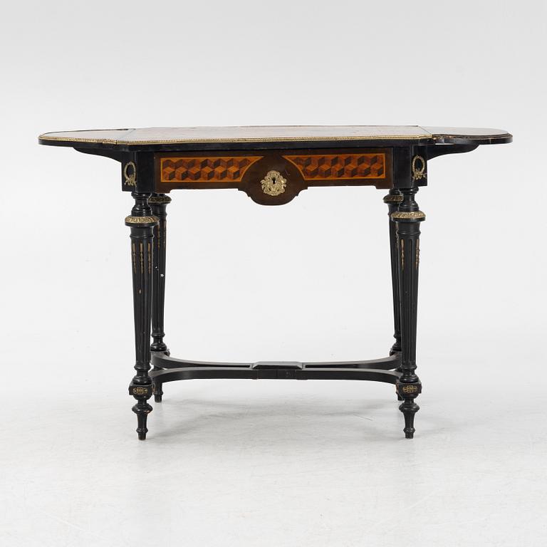 A Louis XVI style table, second half of the 19th century.
