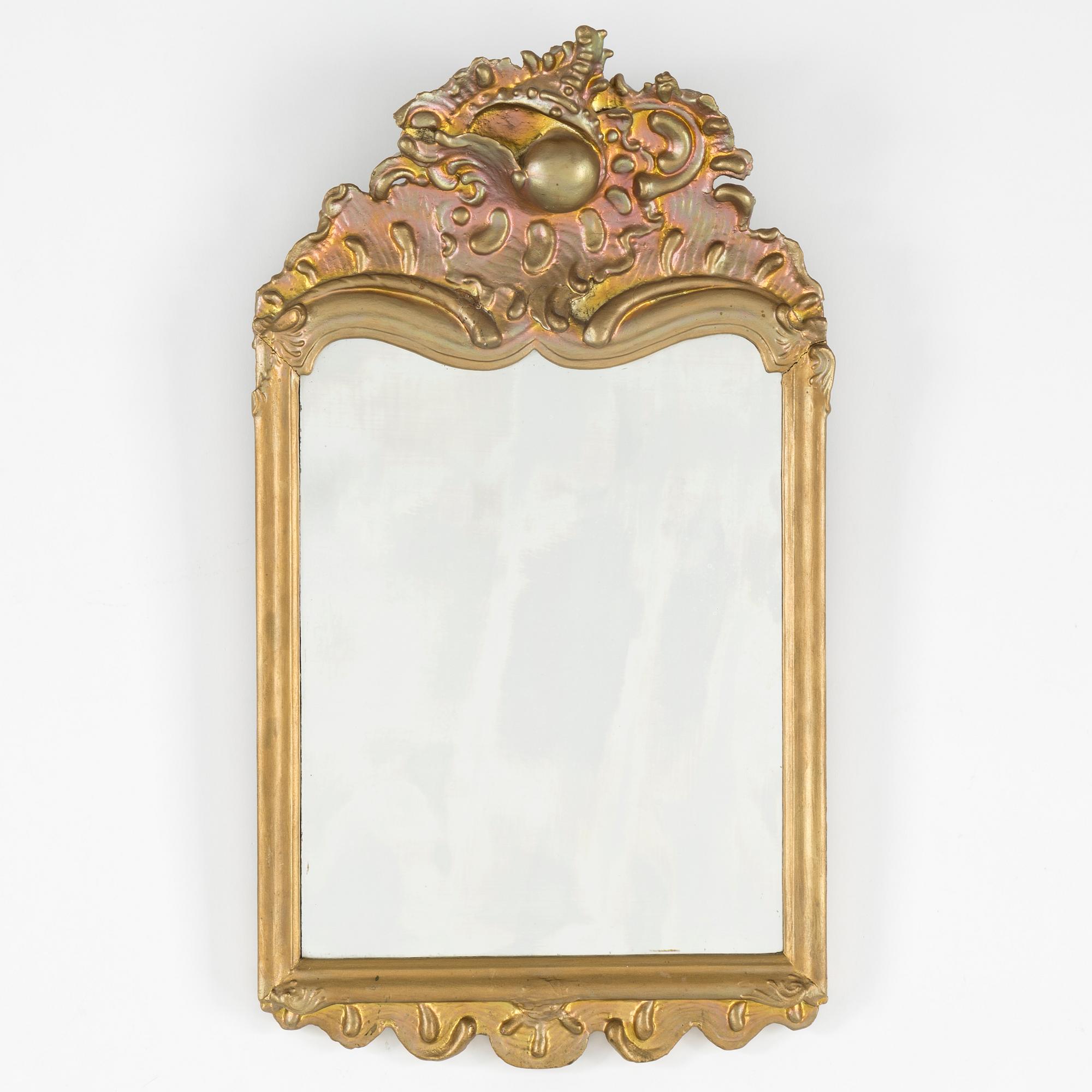A rococo mirror, 18th century.