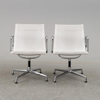 A pair of 'EA 108' desk chairs by Charles & Ray Eames for Vitra.