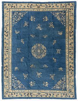 An antique Chinese carpet, c. 355 x 270 cm.
