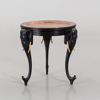 An early 20th Century smoking table, wood and copper.