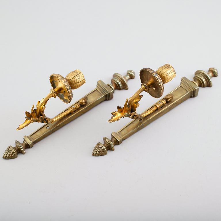 VÄGGLAMPETTER, 1 par, mässing, gustaviansk stil, 1900-talets andra hälft.