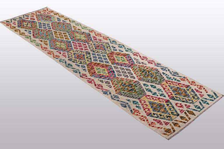 A runner, kilim, ca 249 x 67 cm.