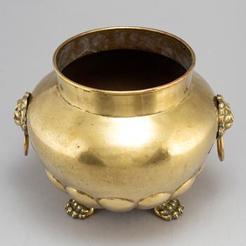 A 19th century brass flower pot.