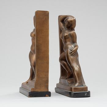 A pair of Axel Gute bronze bookends, Stockholm 1920.