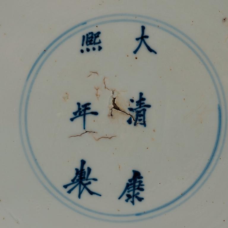 A blue and white dish, Qing dynasty, with Kangxi six character mark and period (1662-1722).