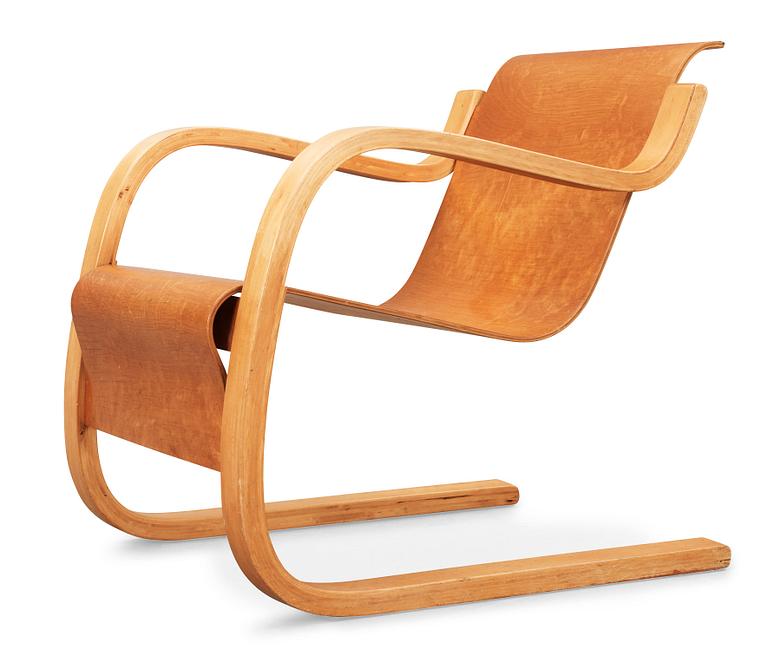 An Alvar Aalto model nr 31 birch armchair, executed on license by Aalto Design Hedemora Sweden 1945-54.