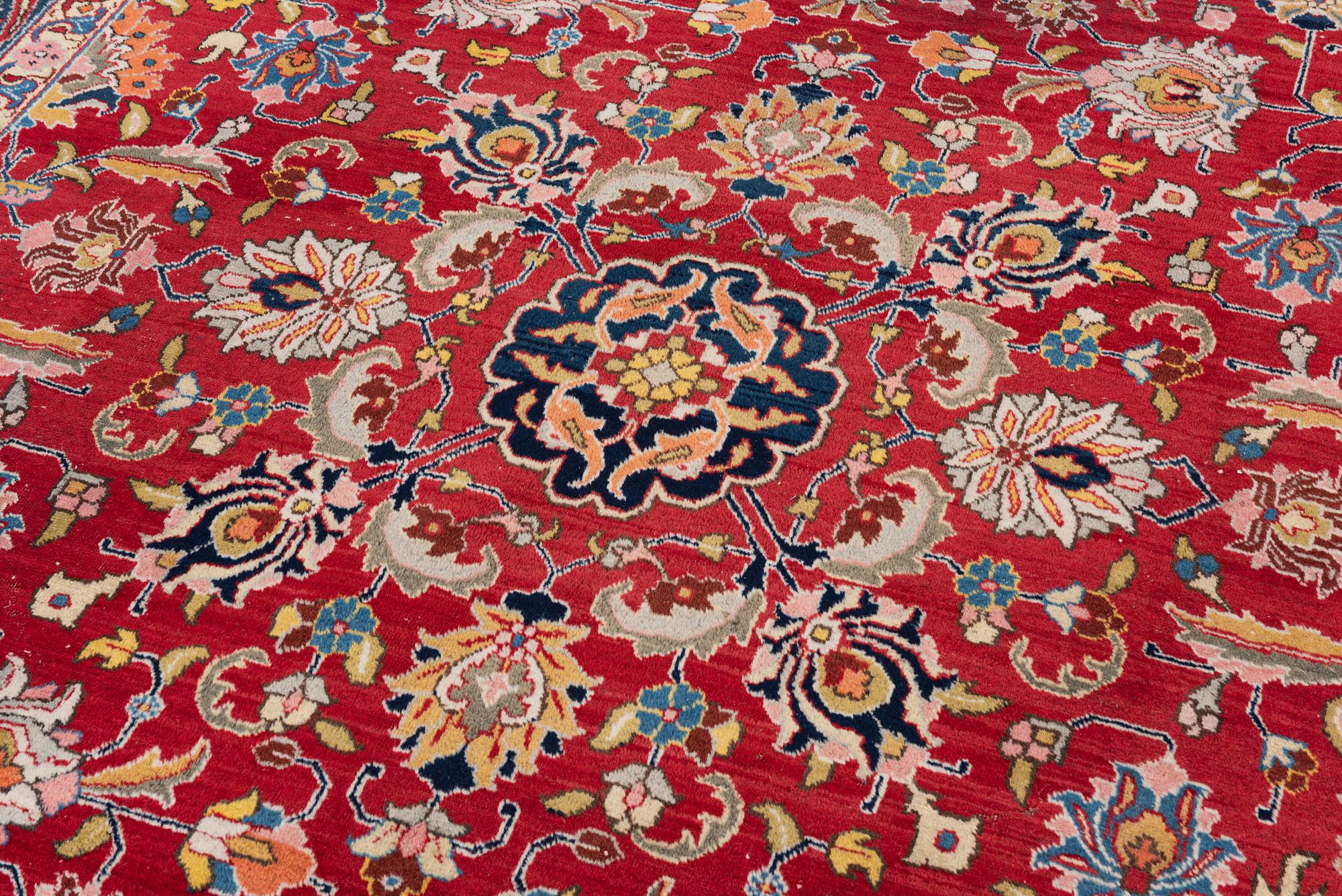 A semi-antique Tabriz carpet, c 358 x 248 cm.