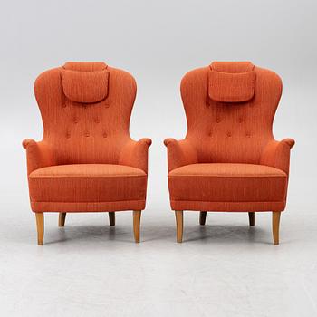Carl Malmsten, a pair of "Farmor" armchairs, O.H.Sjögren, Sweden, later part of the 20th century.