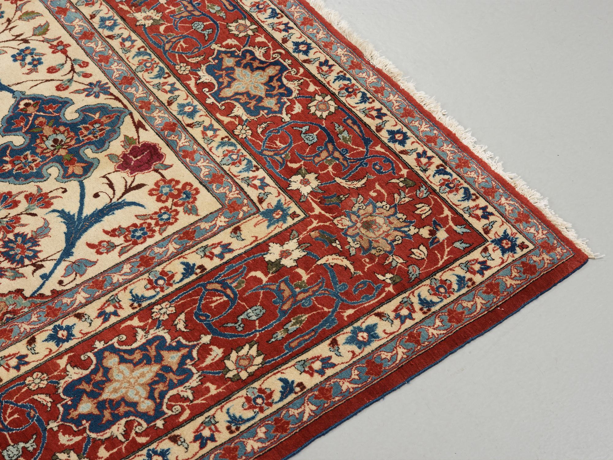 A old Esfahan carpet, around 299 x 210 cm.