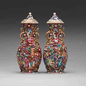 A pair of famille rose vases with covers, Qing dynasty, Qianlong (1736-95).