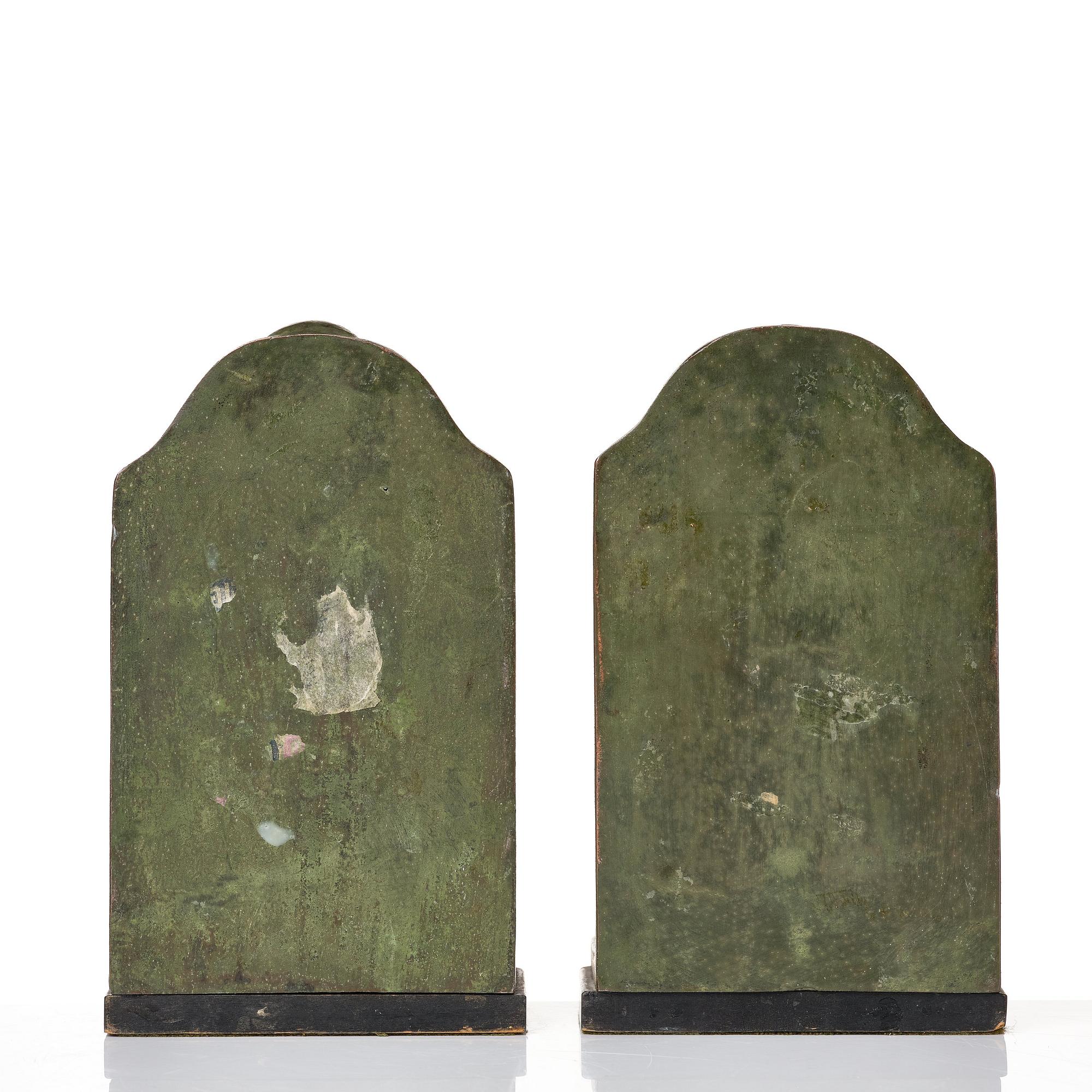 Axel Gute, a pair of green patinated metal bookends, Sweden, dated 1920.