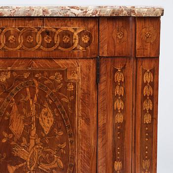 A pair of Louis XVI corner cupboards by Francois Gaspard Teunè (master in Paris from 1766), 18th century.