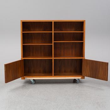 CARL MALMSTEN, a mahogany bookshelf.