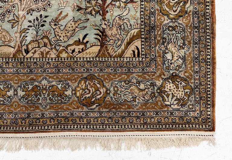 A Ghom, figural, silk rug, c. 205 x 140 cm.