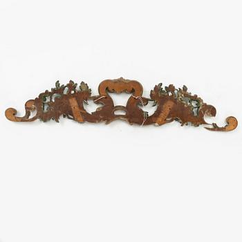 A carved and painted Baroque style wall decoration, 20th Century.
