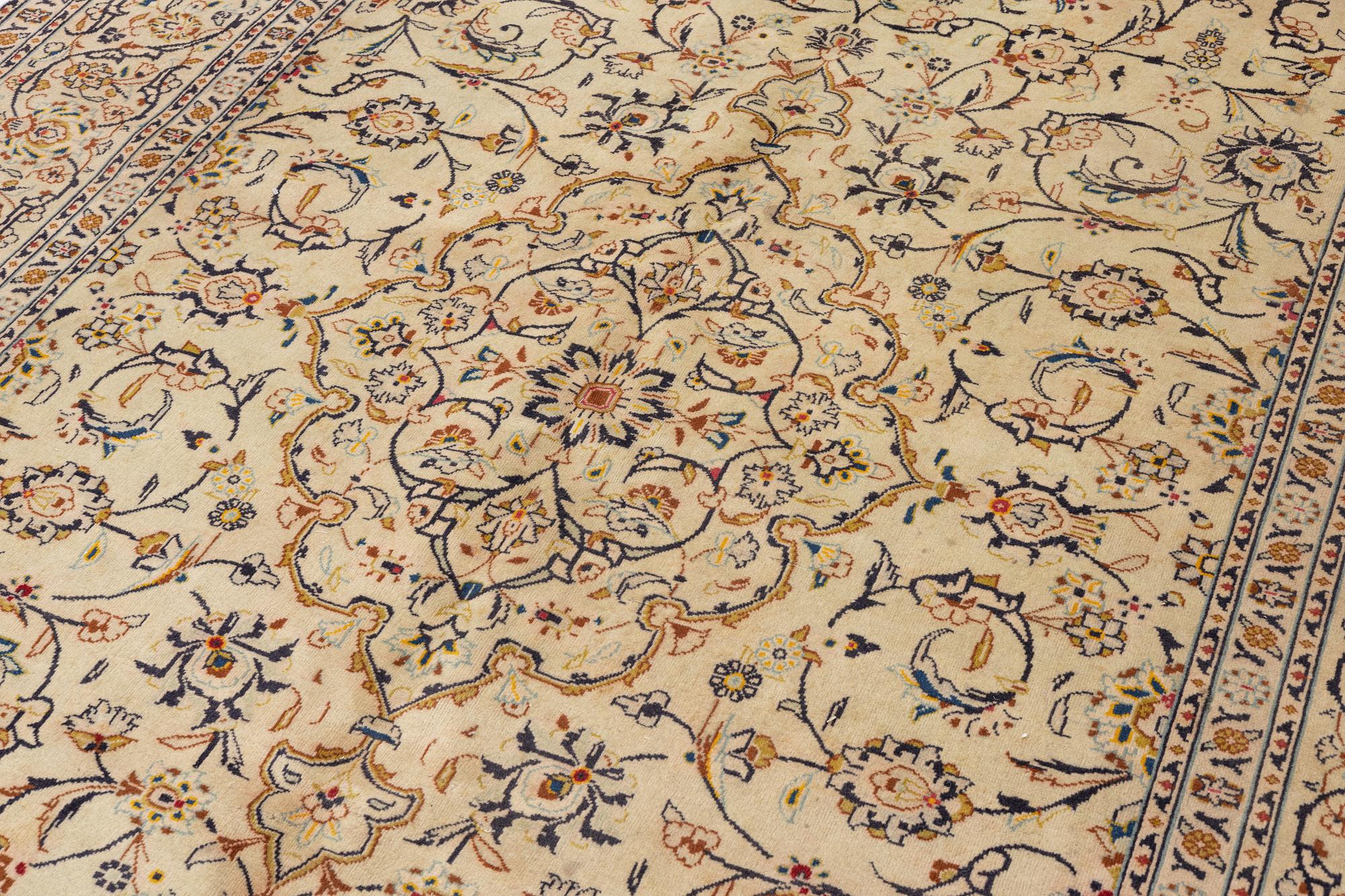 A carpet, Keshan, c. 306 x 214 cm.