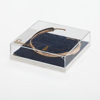A 14K gold bracelet. Kalevala Koru, Helsinki 1960.