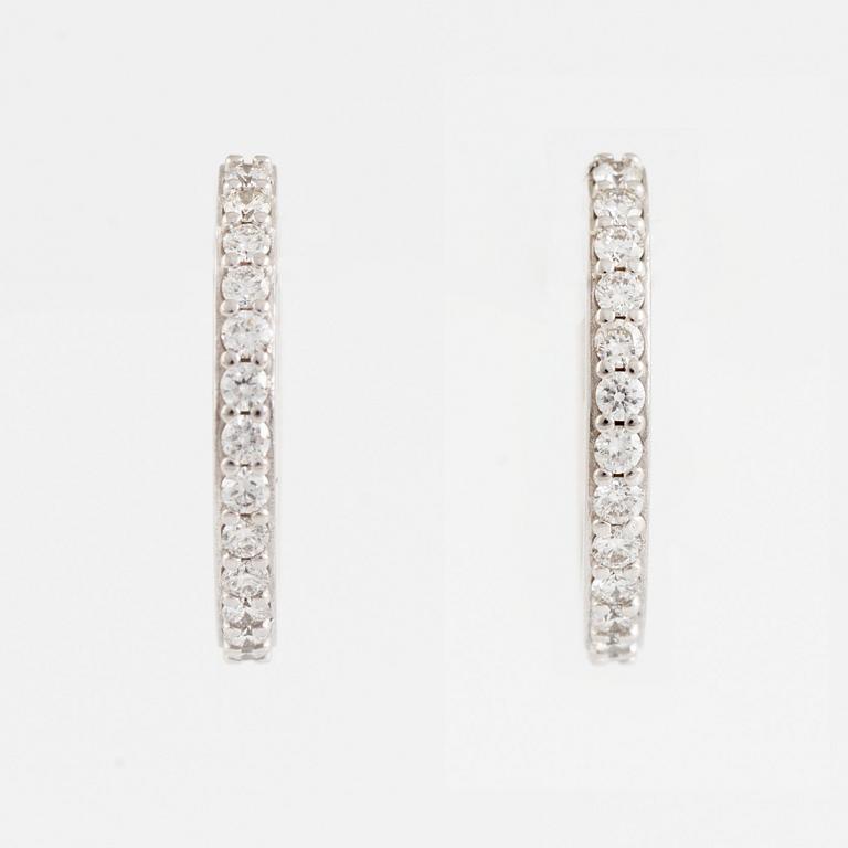 Brilliant cut diamond earrings.