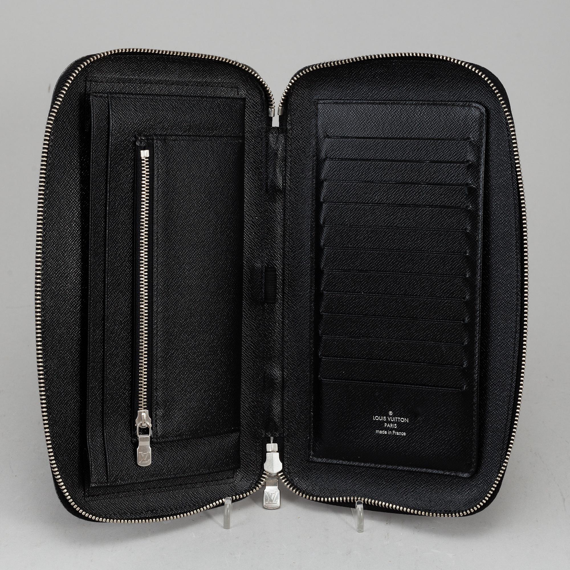 LOUIS VUITTON, an 'Atoll Ardiose' Taiga leather trave organizer, 2015.