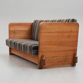 Axel Einar Hjorth, a stained pine "Lovö" sofa, Nordiska Kompaniet, Sweden 1930's.