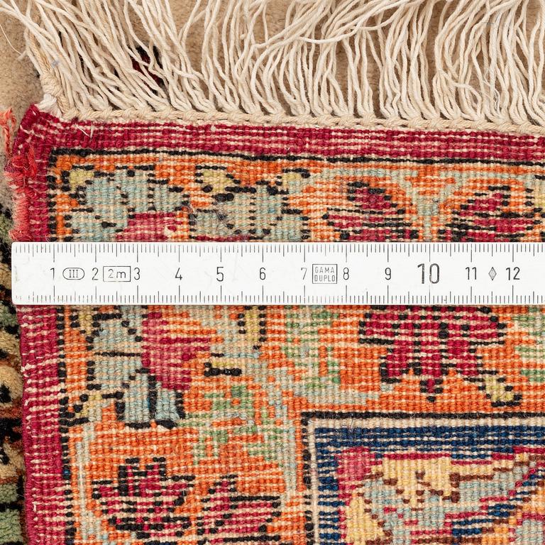 A pair of antique Kerman Raver rugs, c. 215-220 x 135-139 cm.