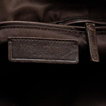 YVES SAINT LAURENT, a metallic bag.